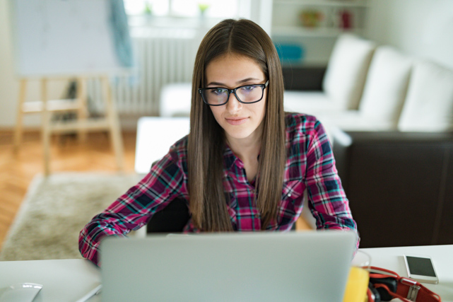 Photo of girl with smart phone at home